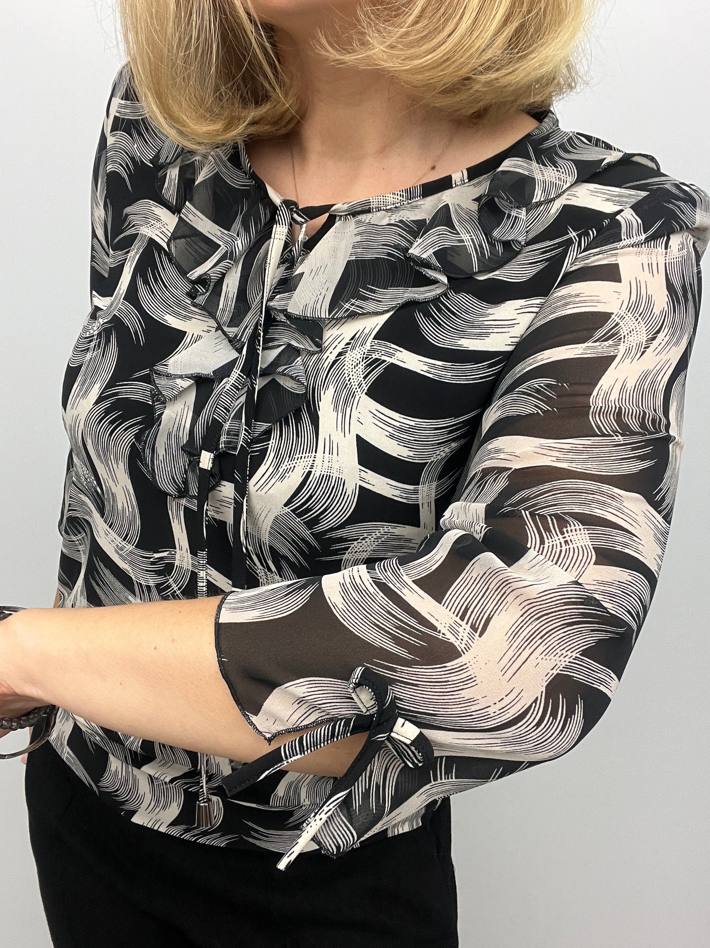 ANDREA ruffle top