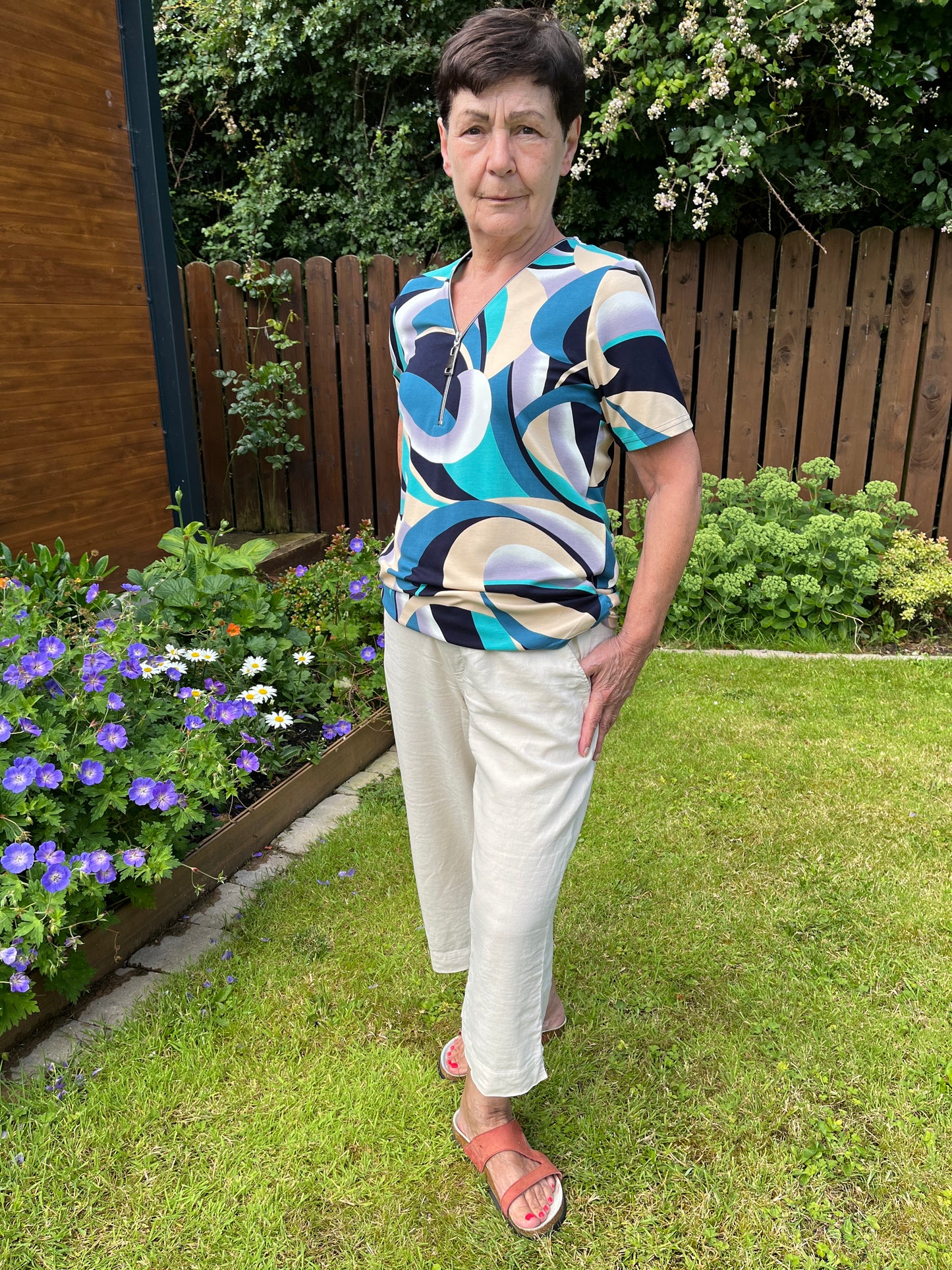 CASSANDRA short sleeve zip top