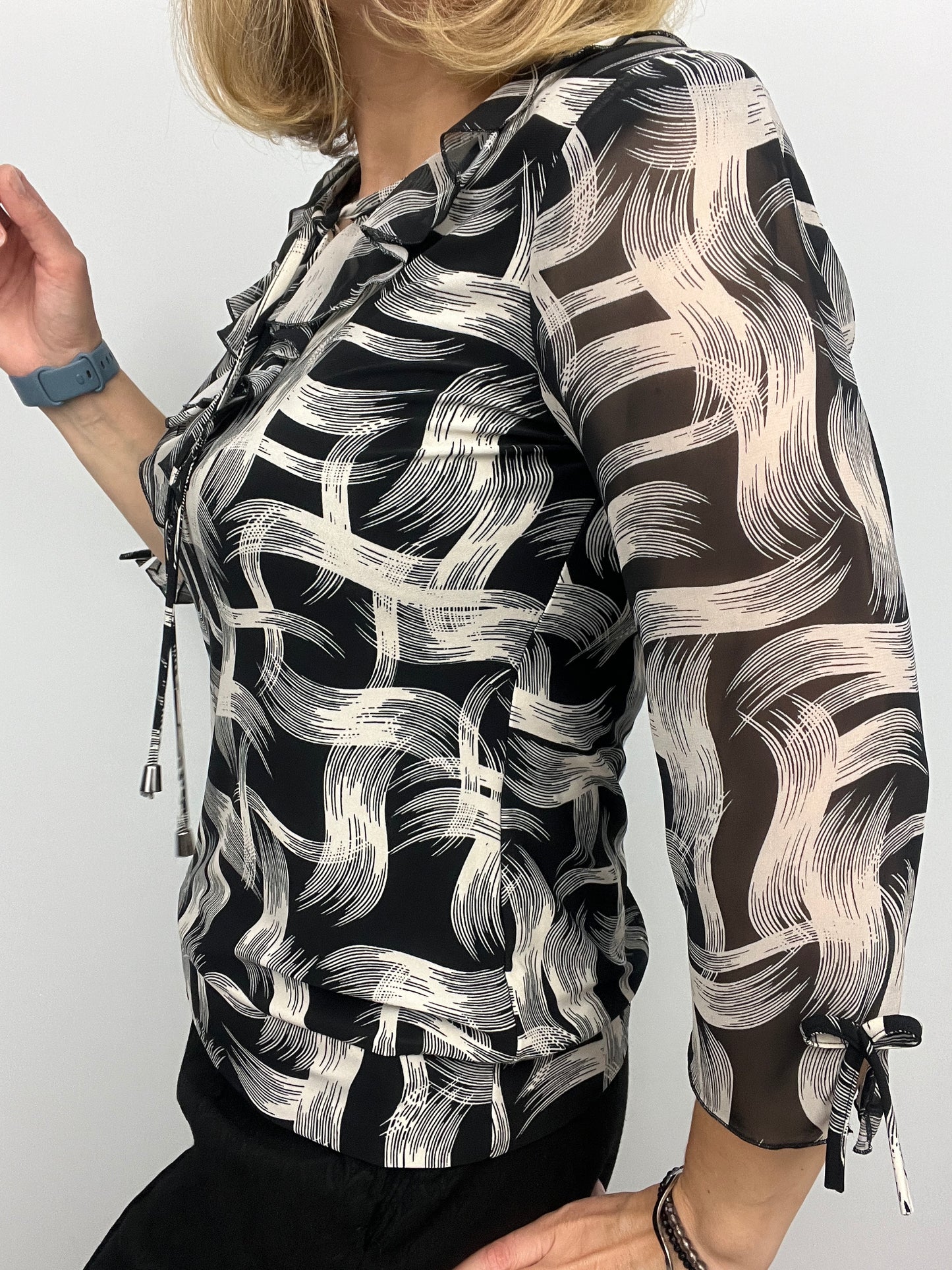 ANDREA ruffle top