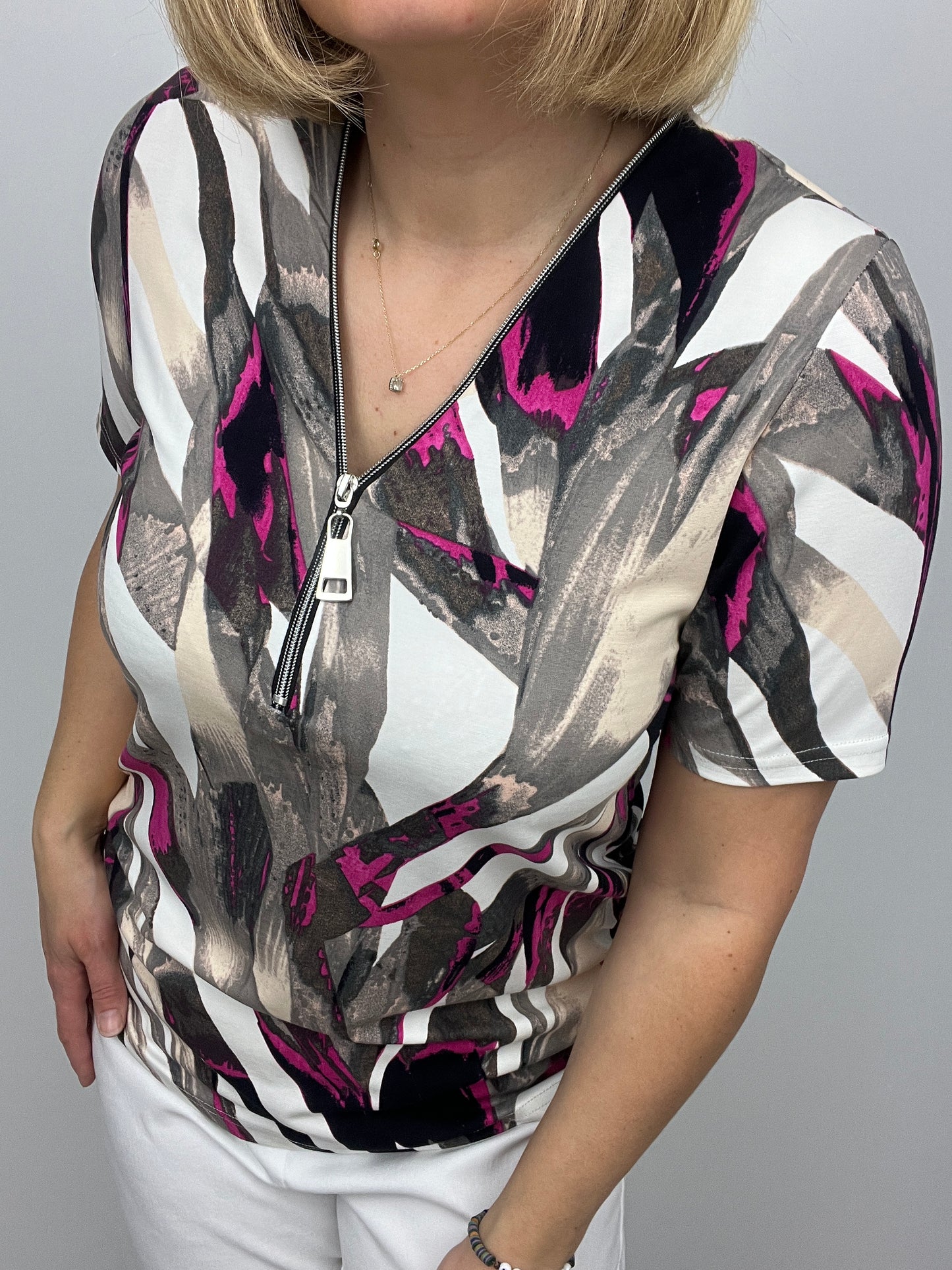 ALEXIS short sleeve zip top