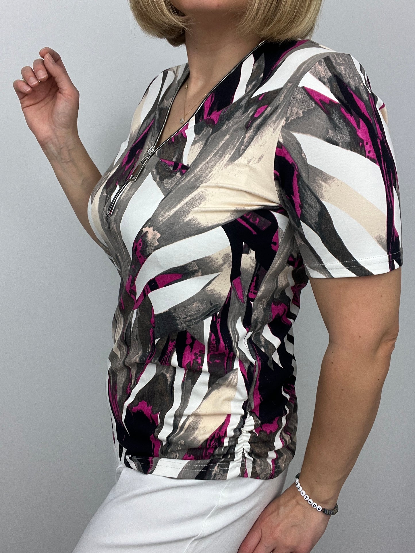 ALEXIS short sleeve zip top