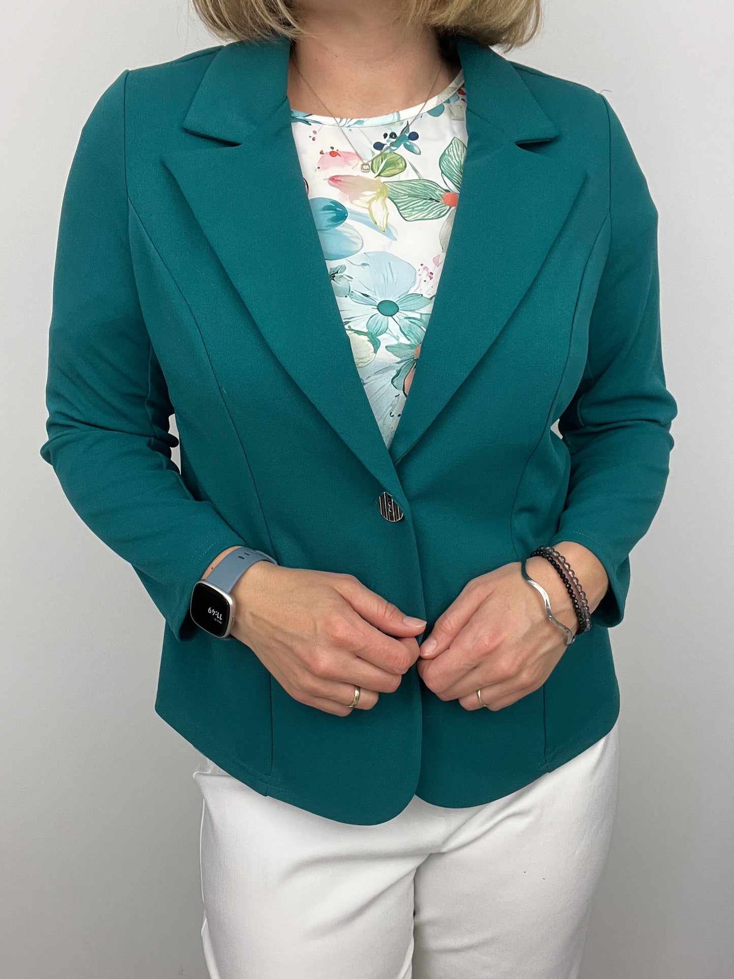 Emerald green fabric jacket with lapel collar