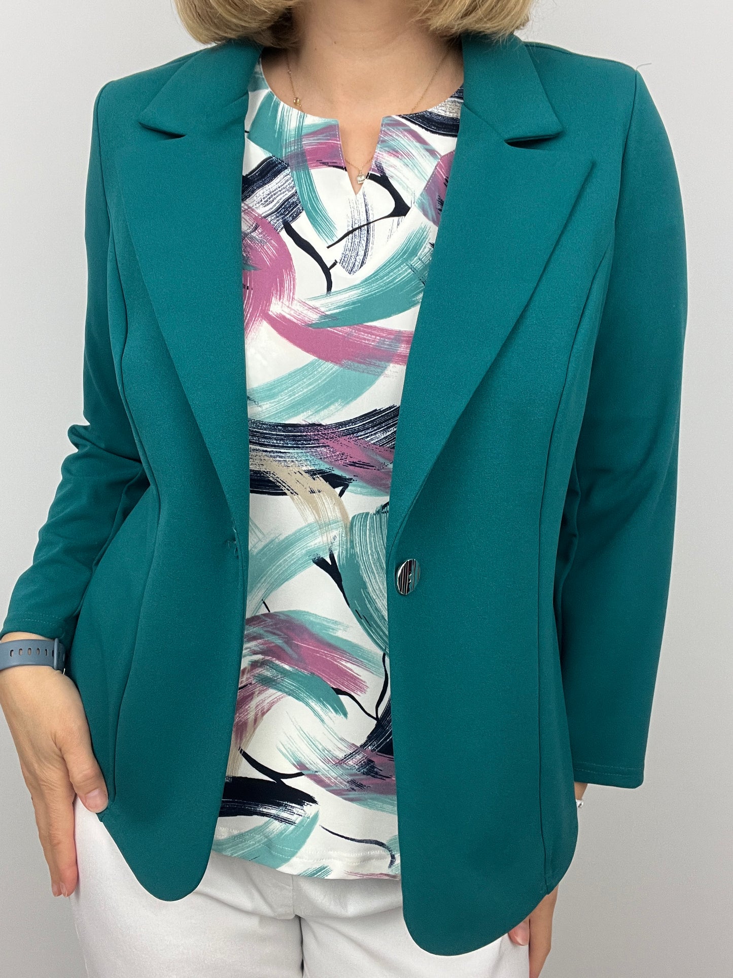 Emerald green fabric jacket with lapel collar