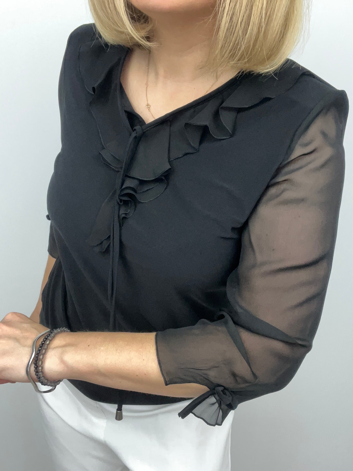 Nora ruffle top black