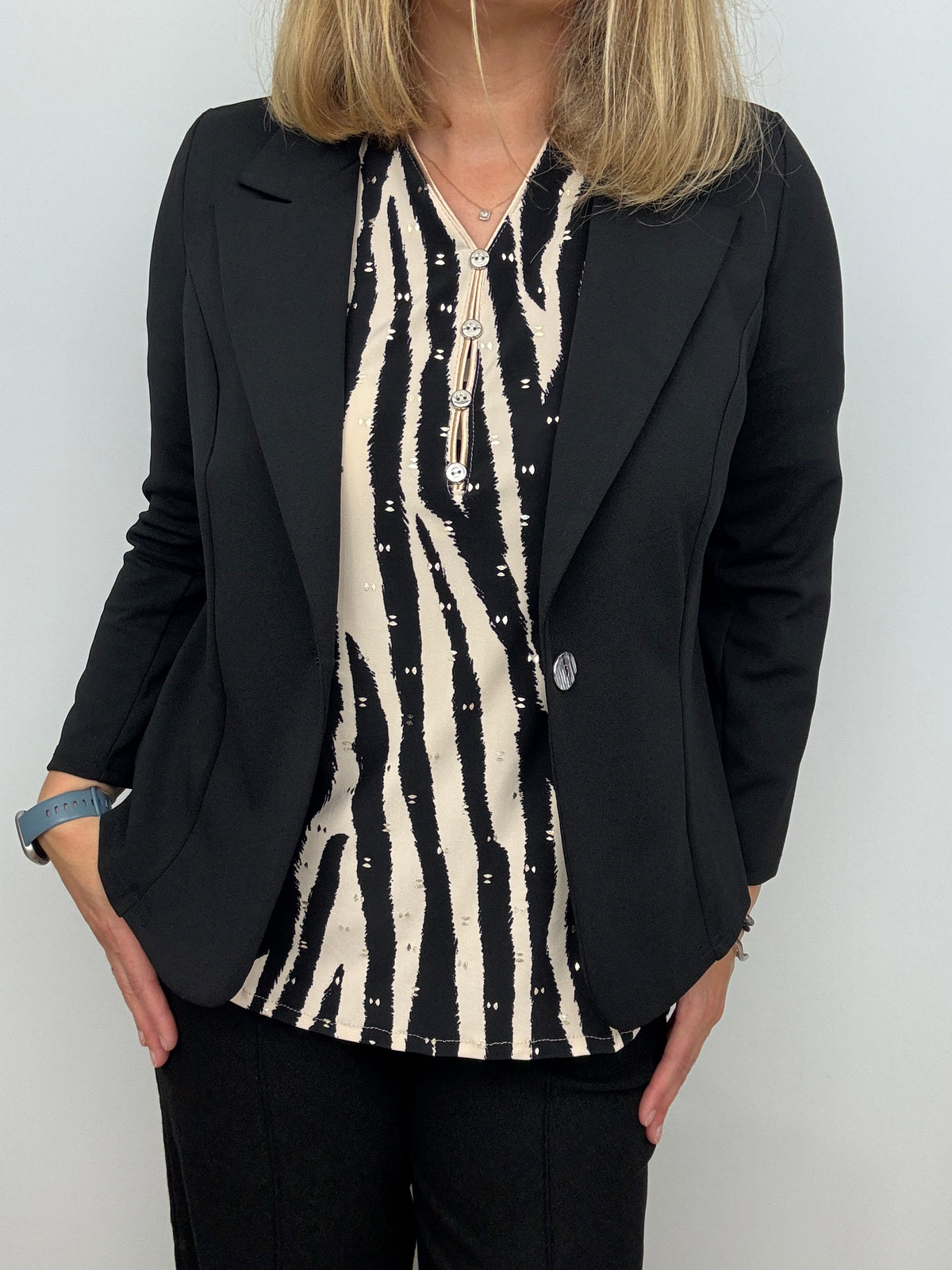 Black fabric jacket with lapel collar