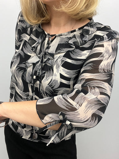 ANDREA ruffle top