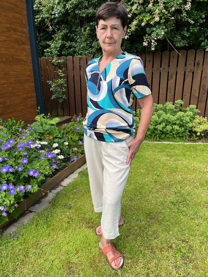 CASSANDRA short sleeve zip top