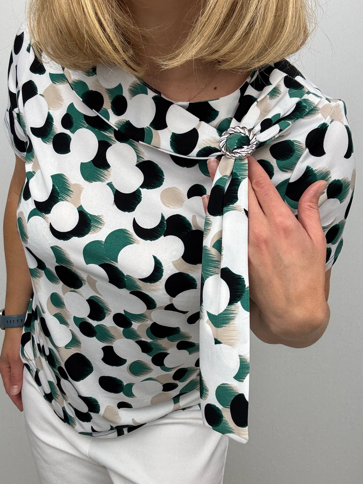 BONNIE top with brooch detail at neckline