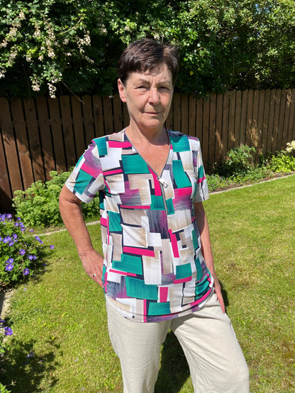 LORETTA short sleeve zip top