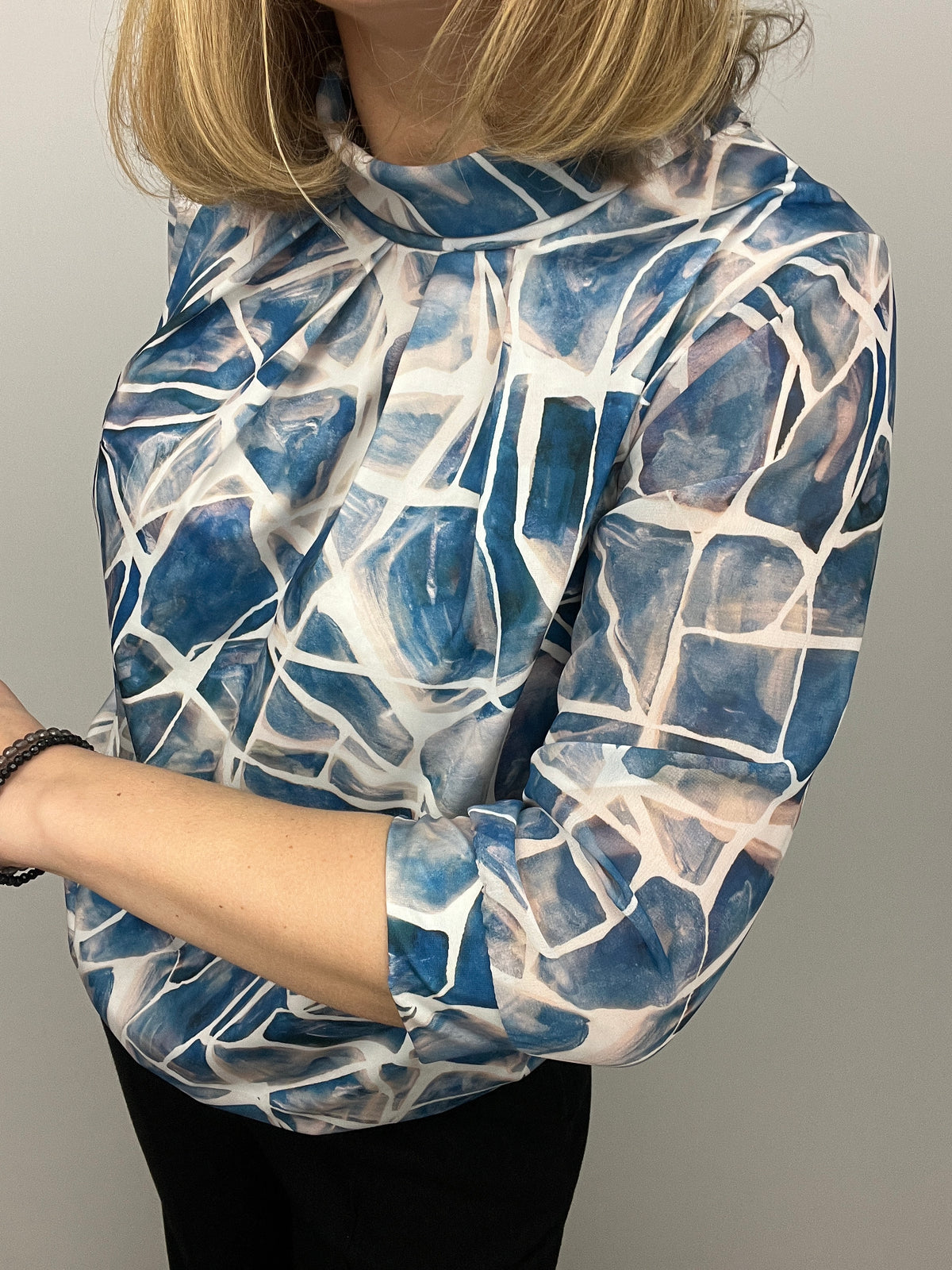 FREYA high neck top with gently elasticated hem