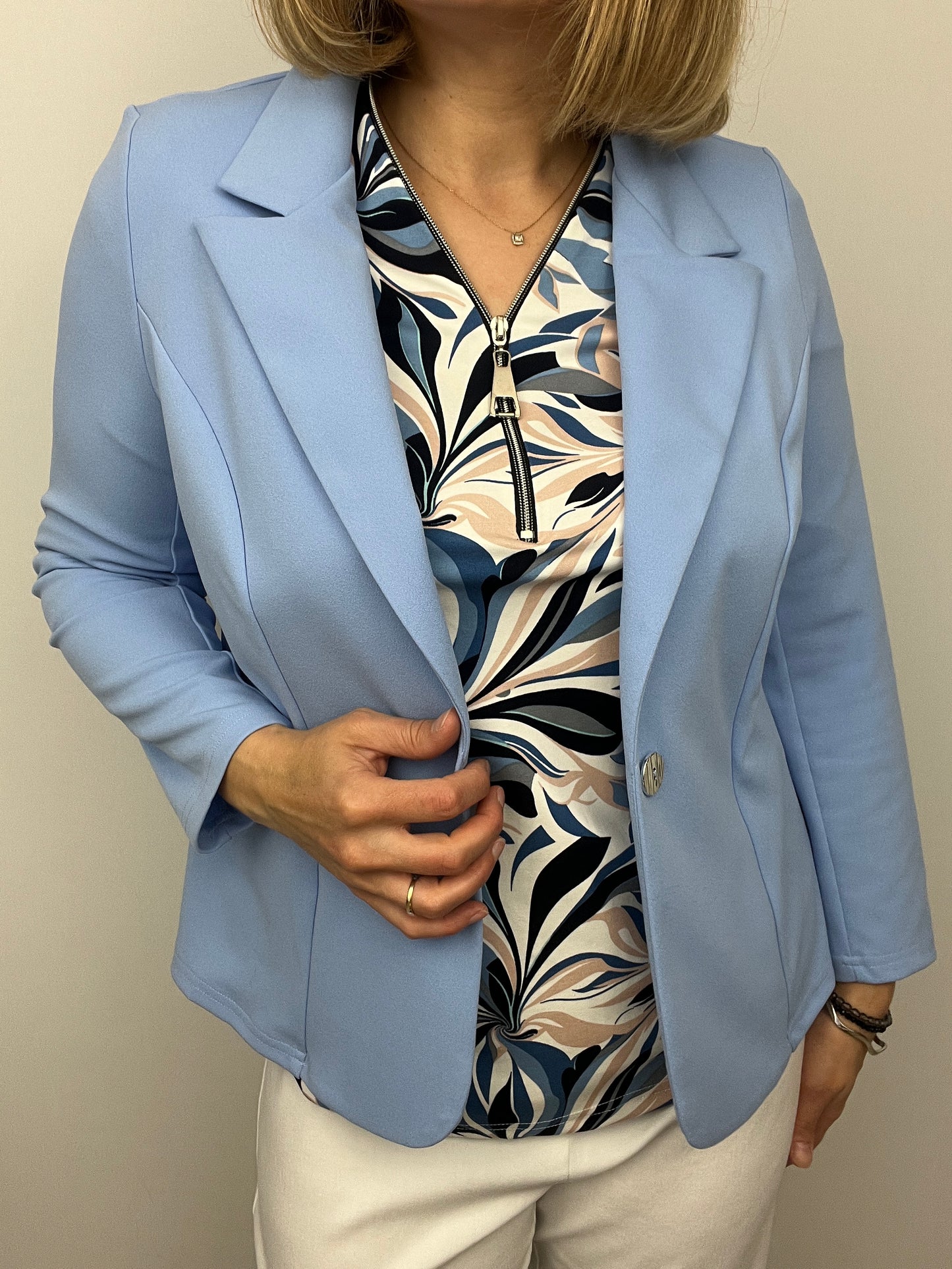 Soft blue fabric jacket with lapel collar