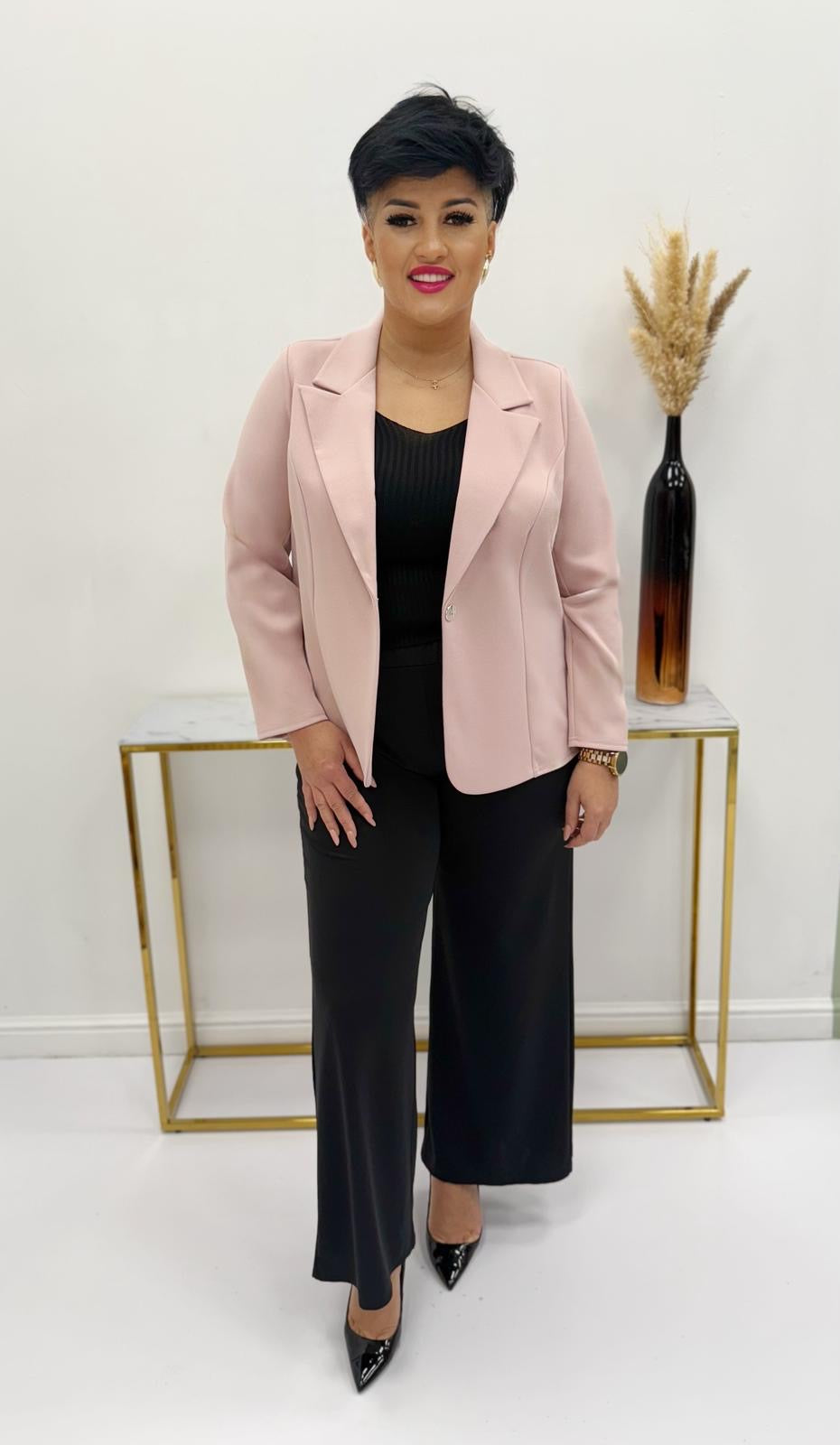 Soft pink fabric jacket with lapel collar