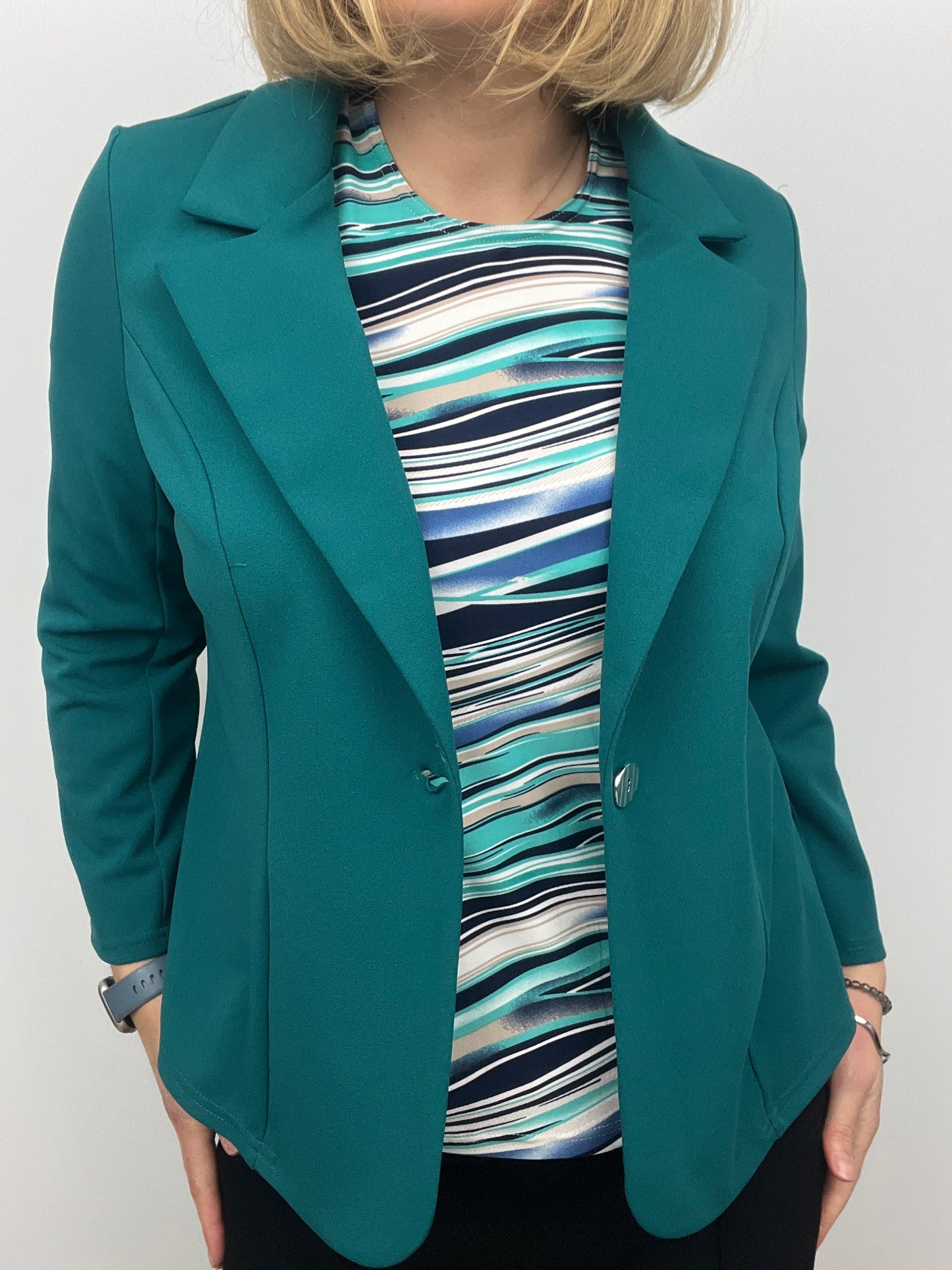 Emerald green fabric jacket with lapel collar