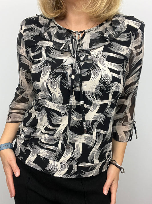 ANDREA ruffle top