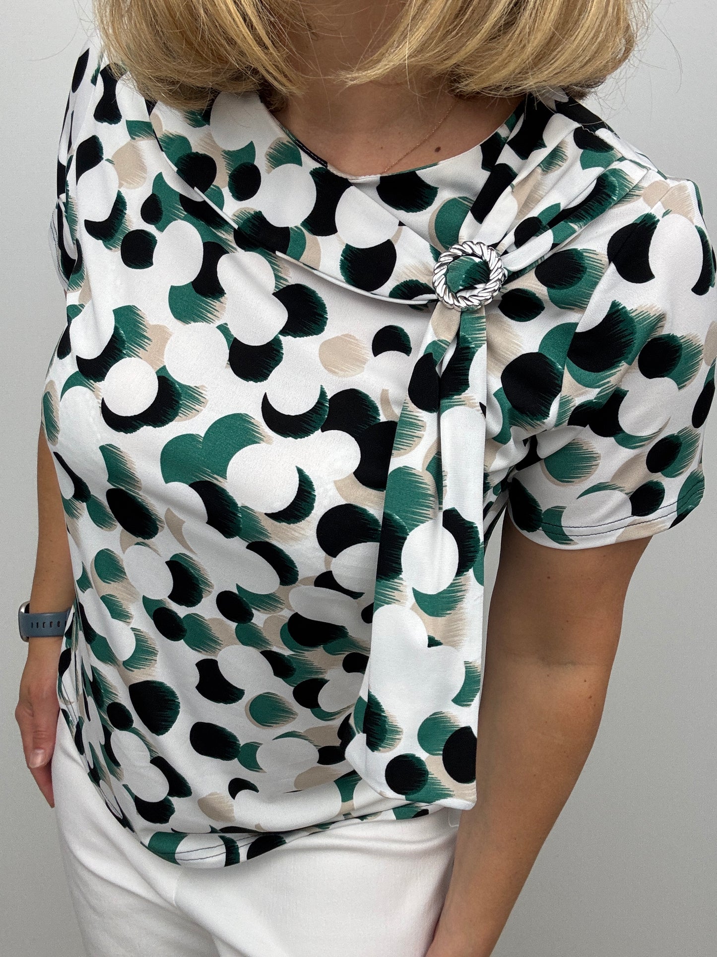 BONNIE top with brooch detail at neckline