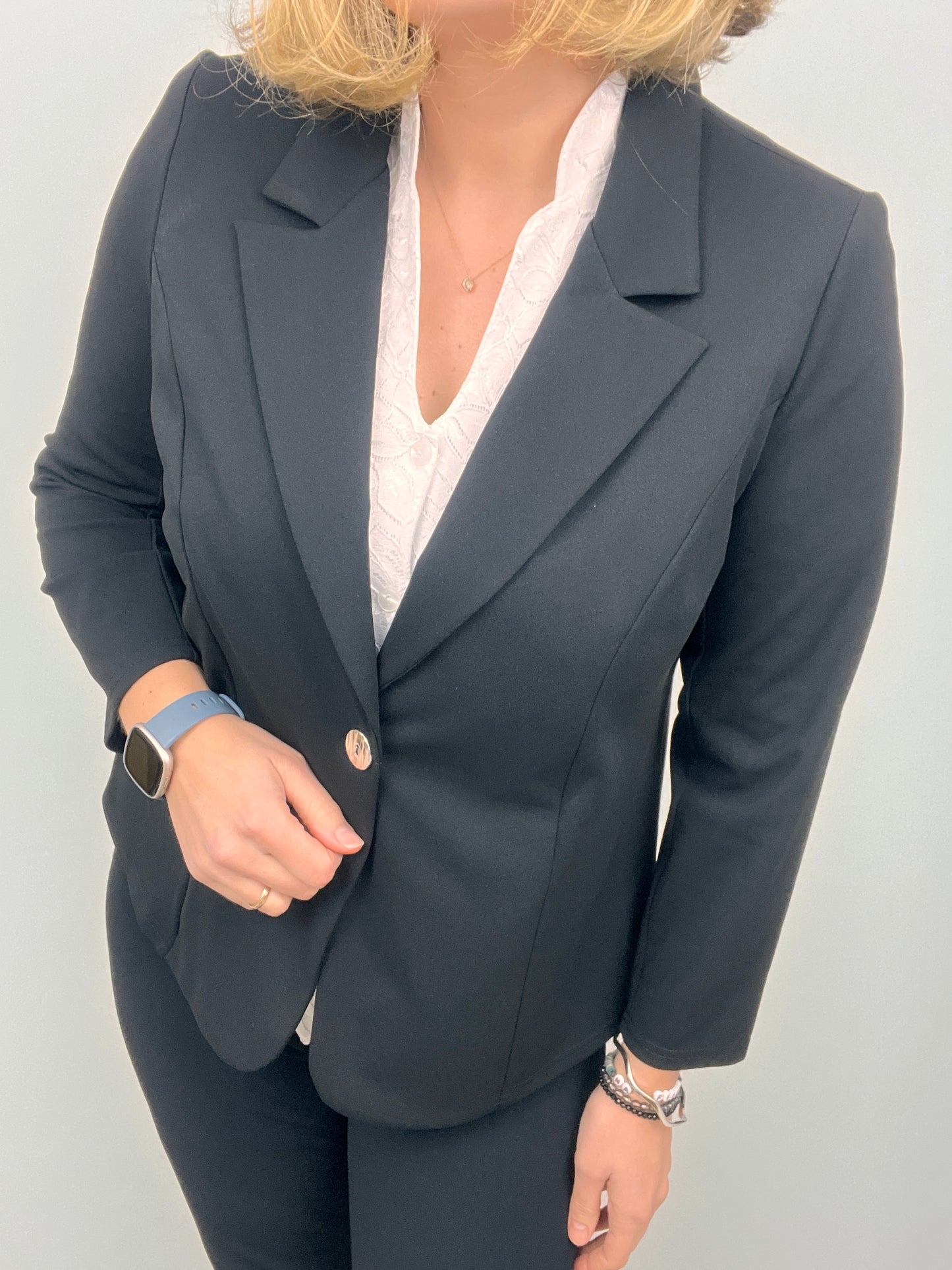 Black fabric jacket with lapel collar