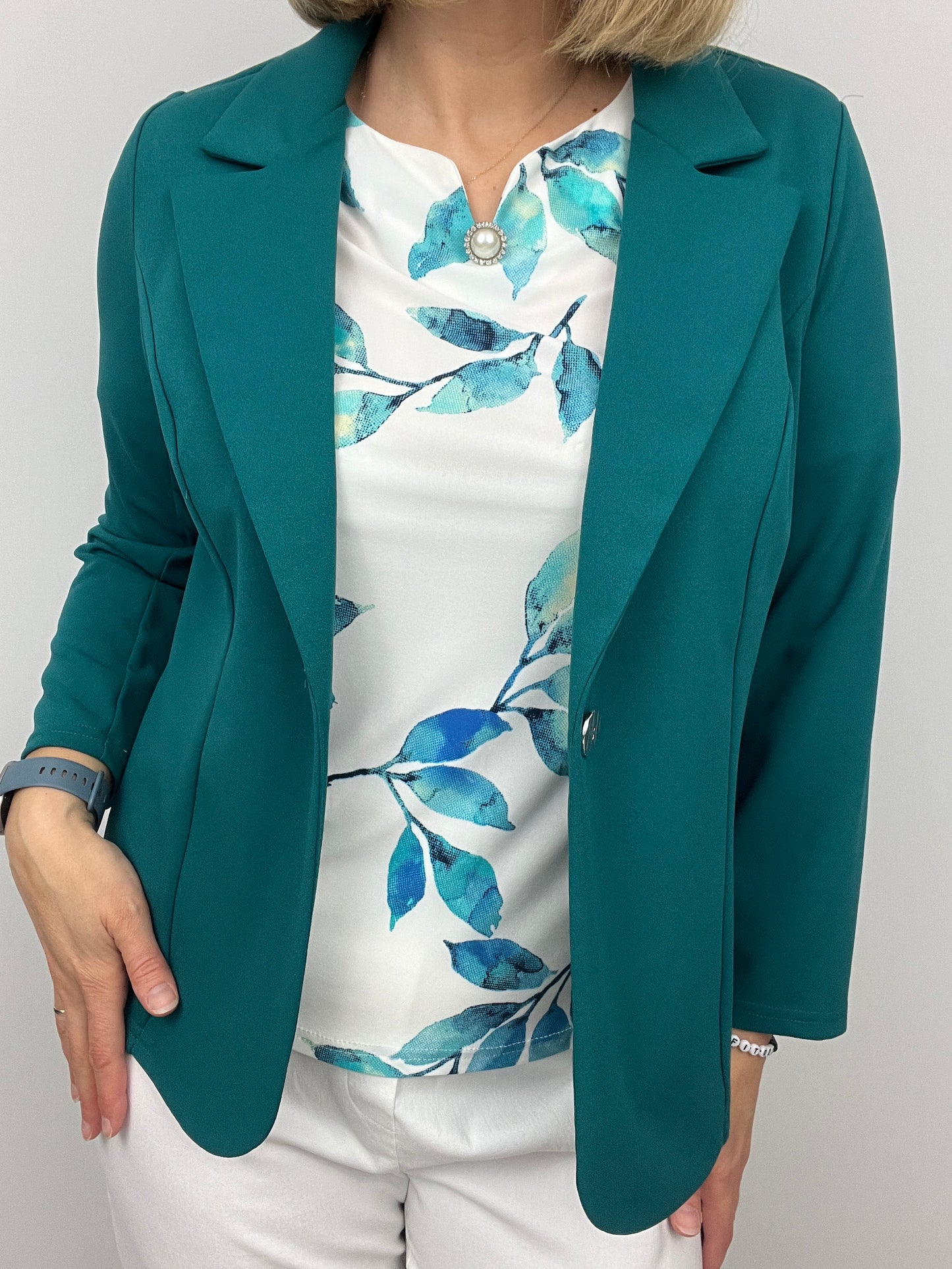 Emerald green fabric jacket with lapel collar