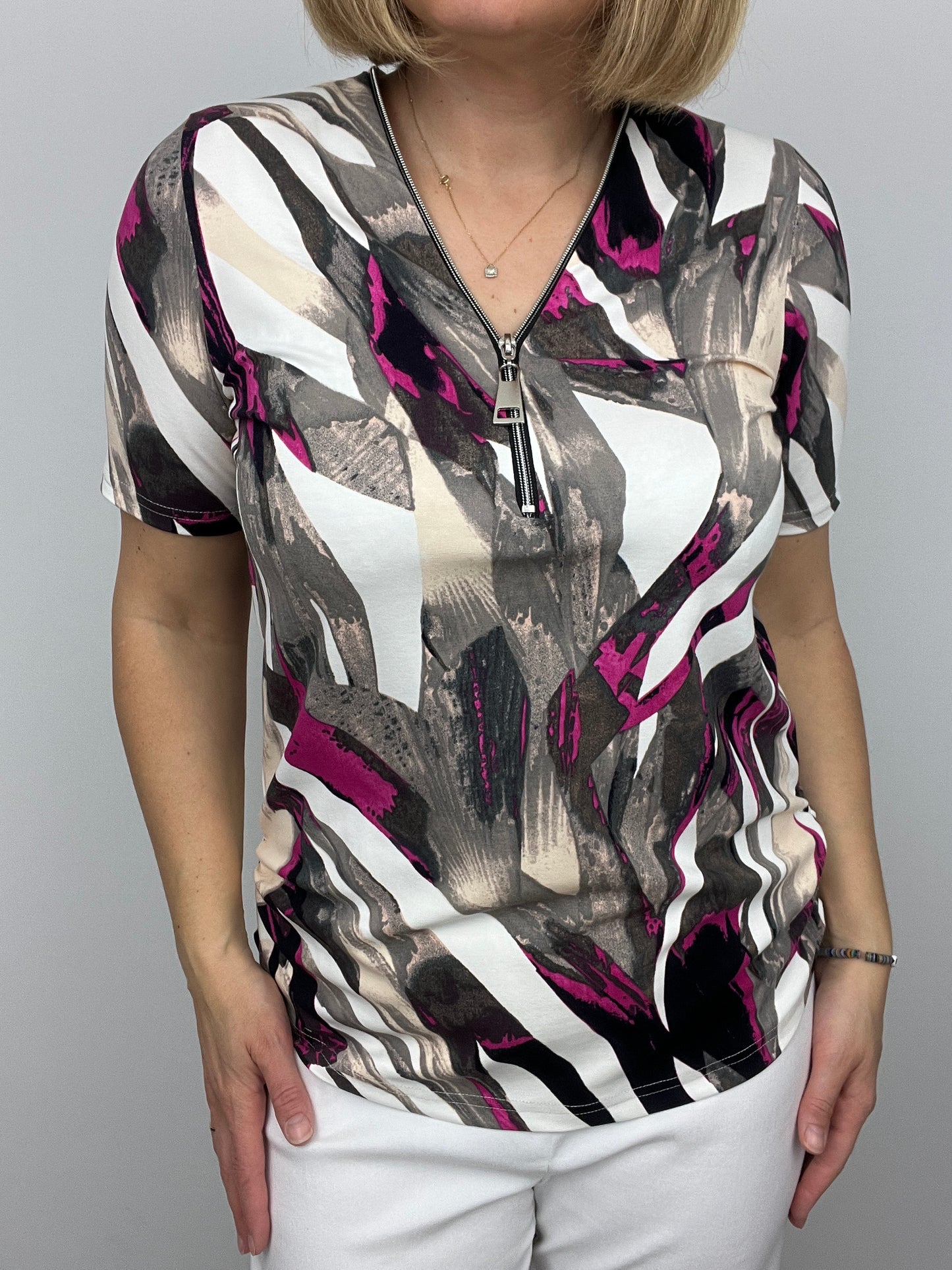 ALEXIS short sleeve zip top