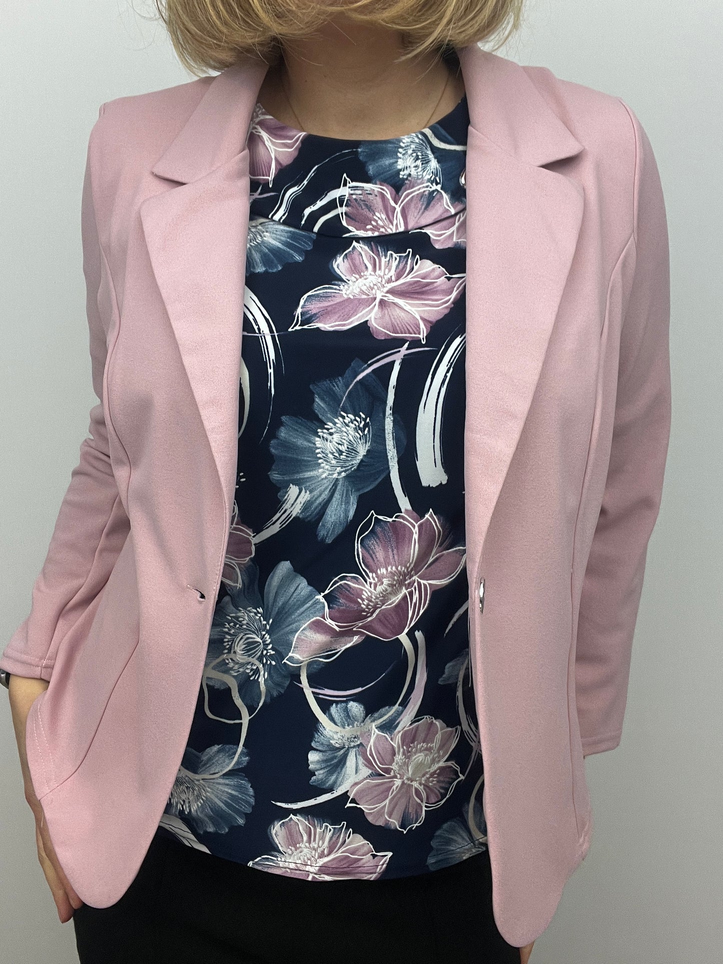 Soft pink fabric jacket with lapel collar