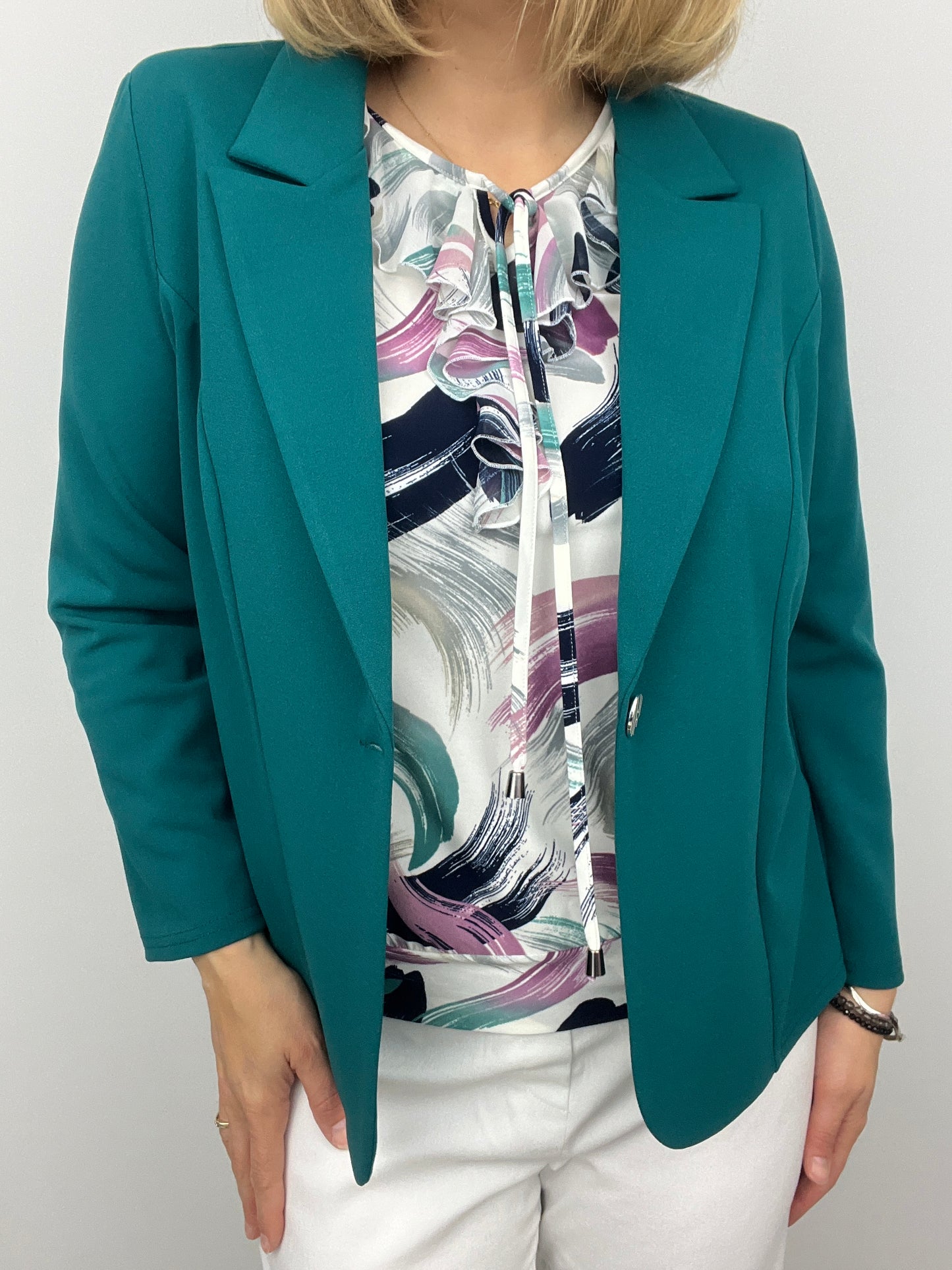 Emerald green fabric jacket with lapel collar