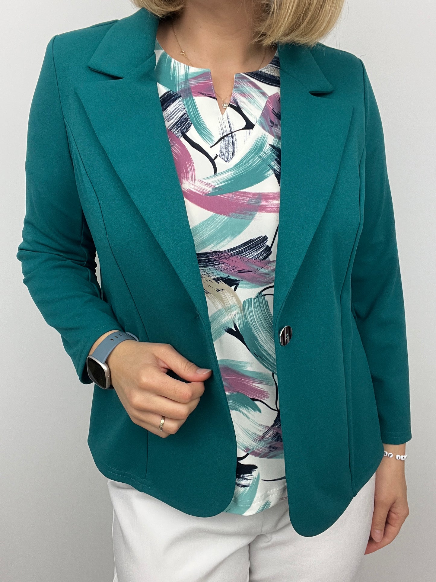 Emerald green fabric jacket with lapel collar