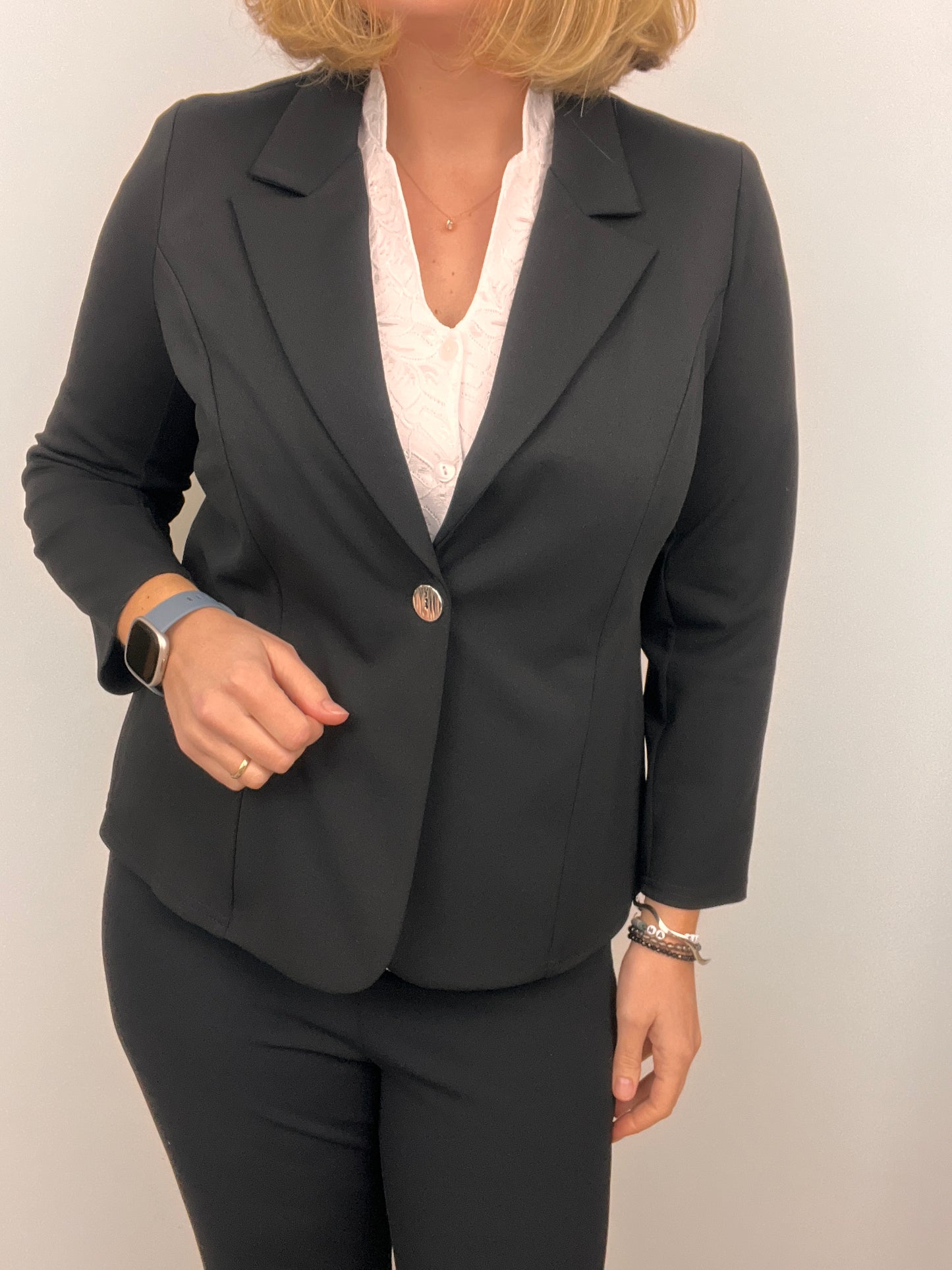 Black fabric jacket with lapel collar