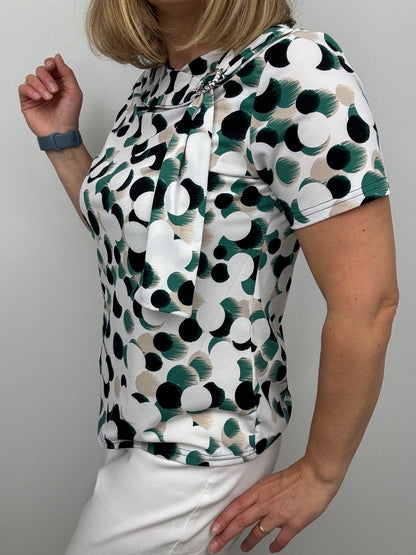 BONNIE top with brooch detail at neckline