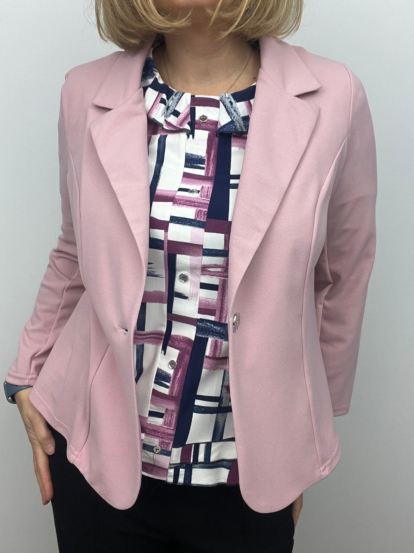 Soft pink fabric jacket with lapel collar