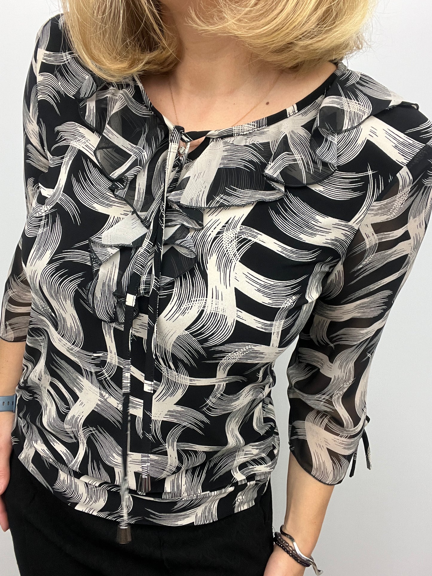 ANDREA ruffle top